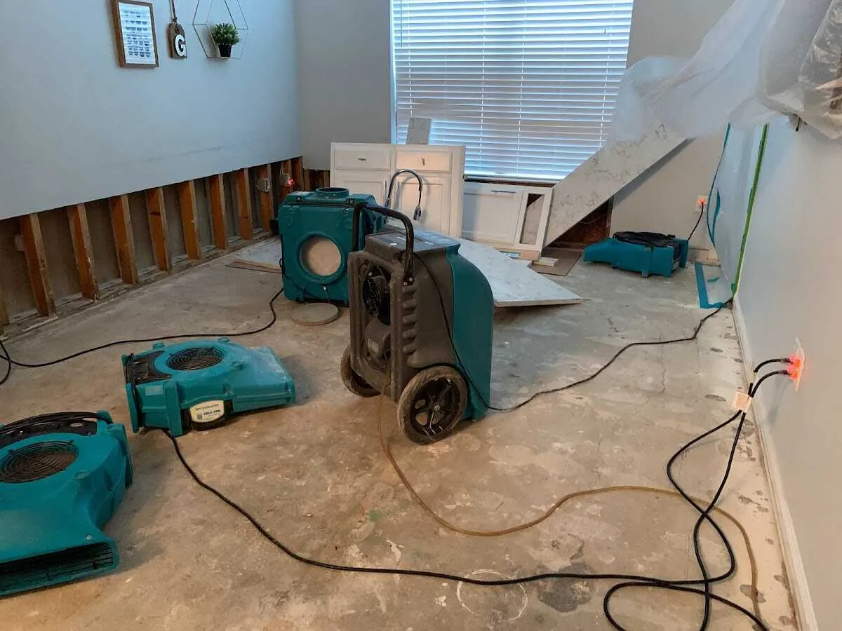 Dehumidifier in flood-cut room for Water Damage Restoration in Elk Ridge